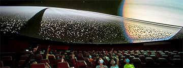 Guests wearing protective masks enjoying Buhl Planetarium